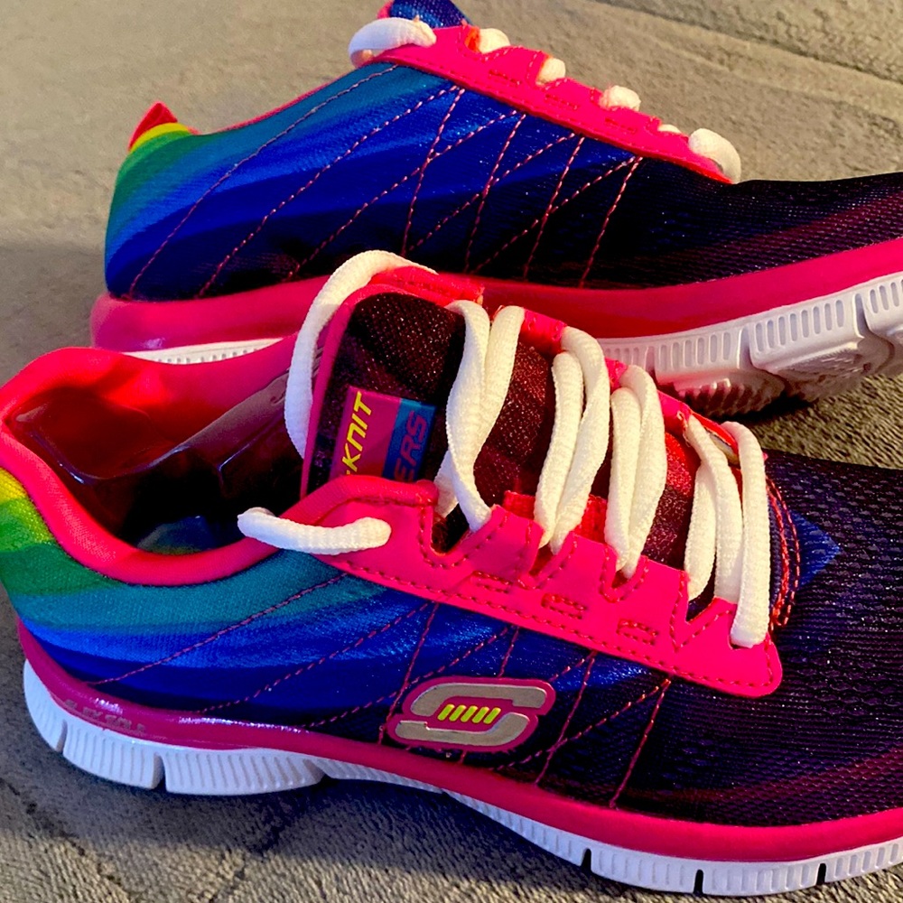 Brand new flex sole Skechers purple and pink really cute size 1 shoe.